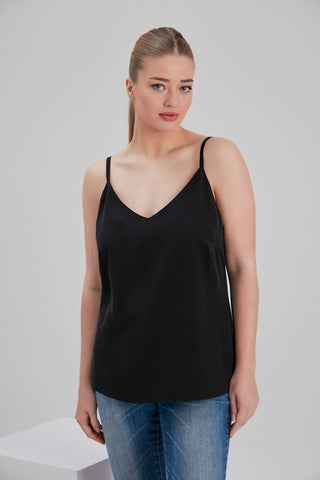 tall plus size women wearing noacode size inclusive sustainable tencel top with denim 