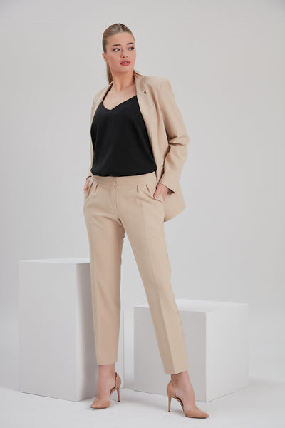tall woman wearing noacode size inclusive ethically made black tencel top with office blazer suit